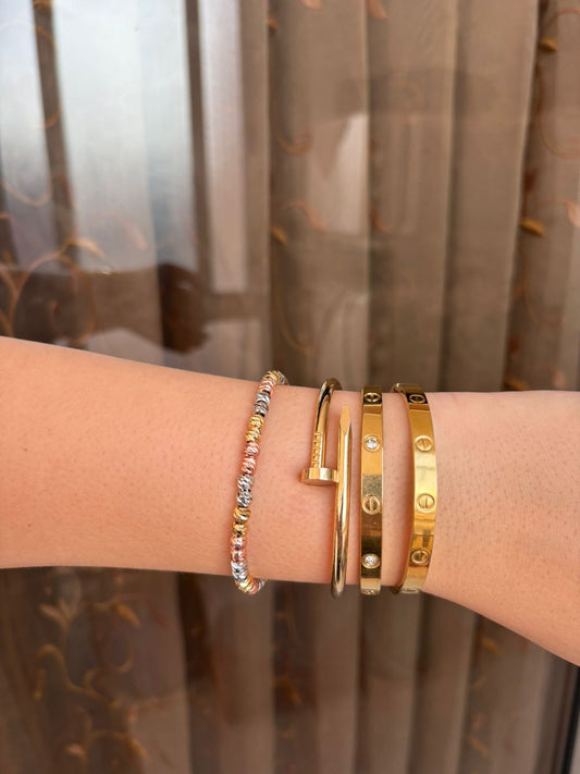 Cartier set with 3 colors bracelet .